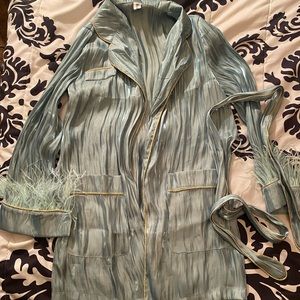 ✨✨ WANT TO STAND OUT ? .. talk about a show stopper . Wrap top, dress, or robe .